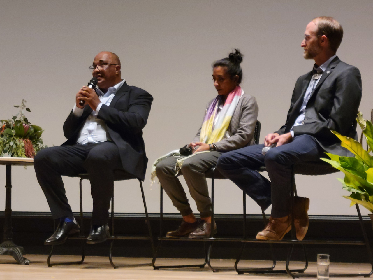 Lily and two other panel members during the forum.