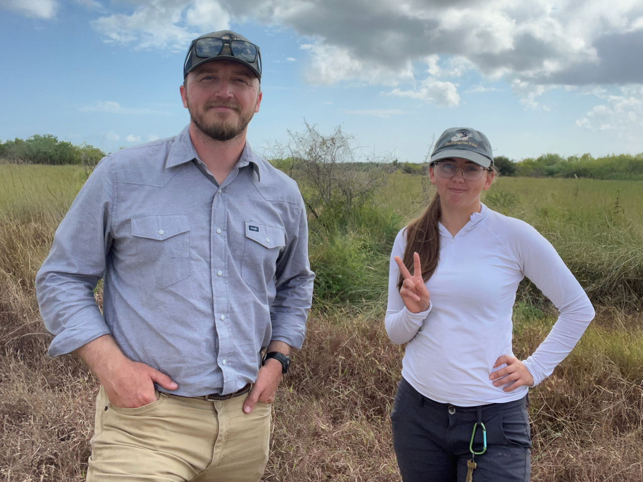 Braden Hollis and Bella Dulaney posing on the Texas coastal prairie.