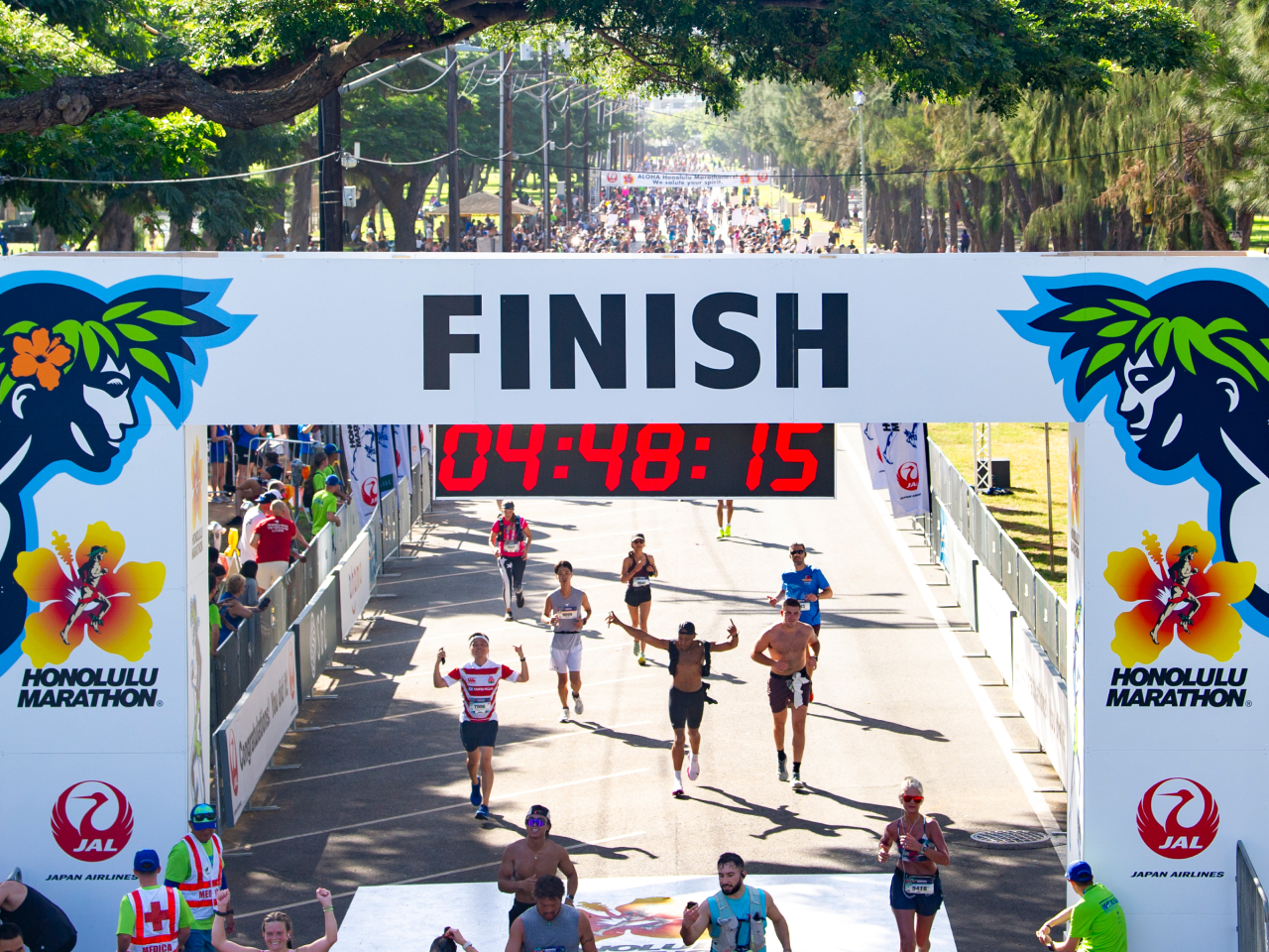 Runners approaching the finish line of the JAL Honolulu Marathon.