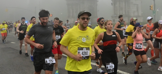 People running in a foot race in Brooklyn, New York