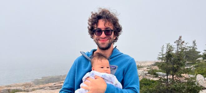 A man holding a baby