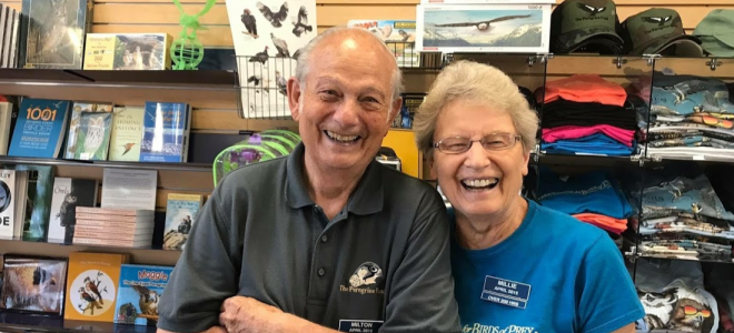 Volunteers Milton and Millie smiling from ear to ear