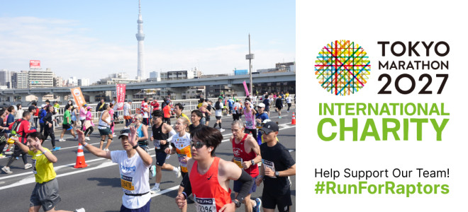 Tokyo Marathon runners with the Tokyo Skytree visible in the background.