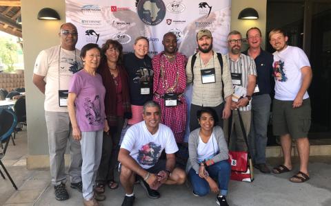 A group of The Peregrine Fund's staff and students at an Raptor Research Foundation meeting in South Africa