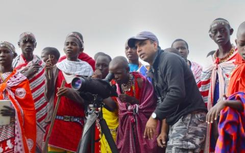 Dr. Munir Virani works with a group of Masai Mentors