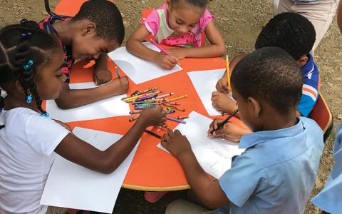 children draw hawks in the Dominican Republic