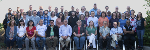 A group of The Peregrine Fund's staff sit for a photograph