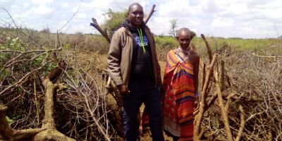 Kelvin beside a boma with a local rancher
