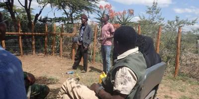 Biologists in Kenya giving a talk to locals