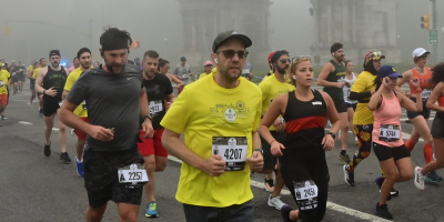 People running in a foot race in Brooklyn, New York