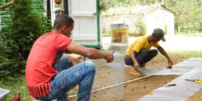 Team members Building chicken coops in Dominican Republic