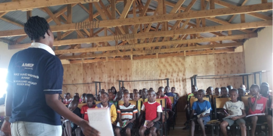 Biologist providing training to local community members