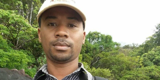 A closeup of Armand Benjara in the field.