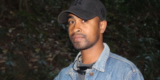 A closeup of Seraphin Fabrice in the field at night.